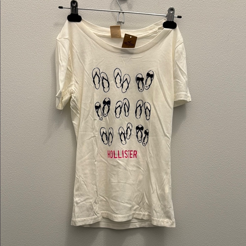 Hollister Off-White Tee with Flip-Flop Design
